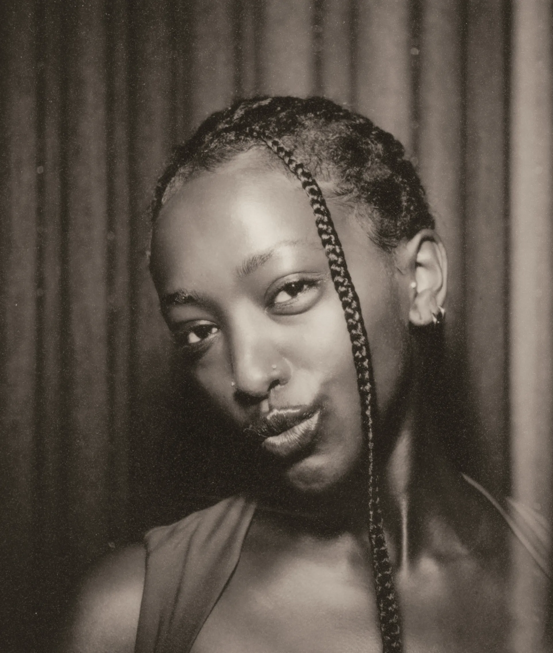 Film photo booth strip frame three: a playful pout